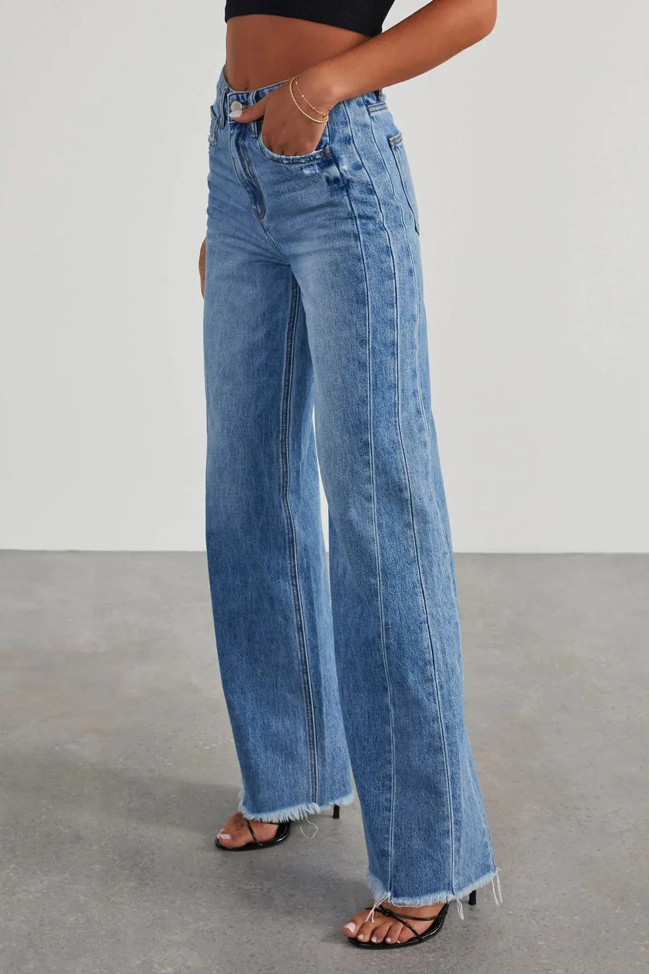 Mid-waisted Raw Edge Hem Jeans